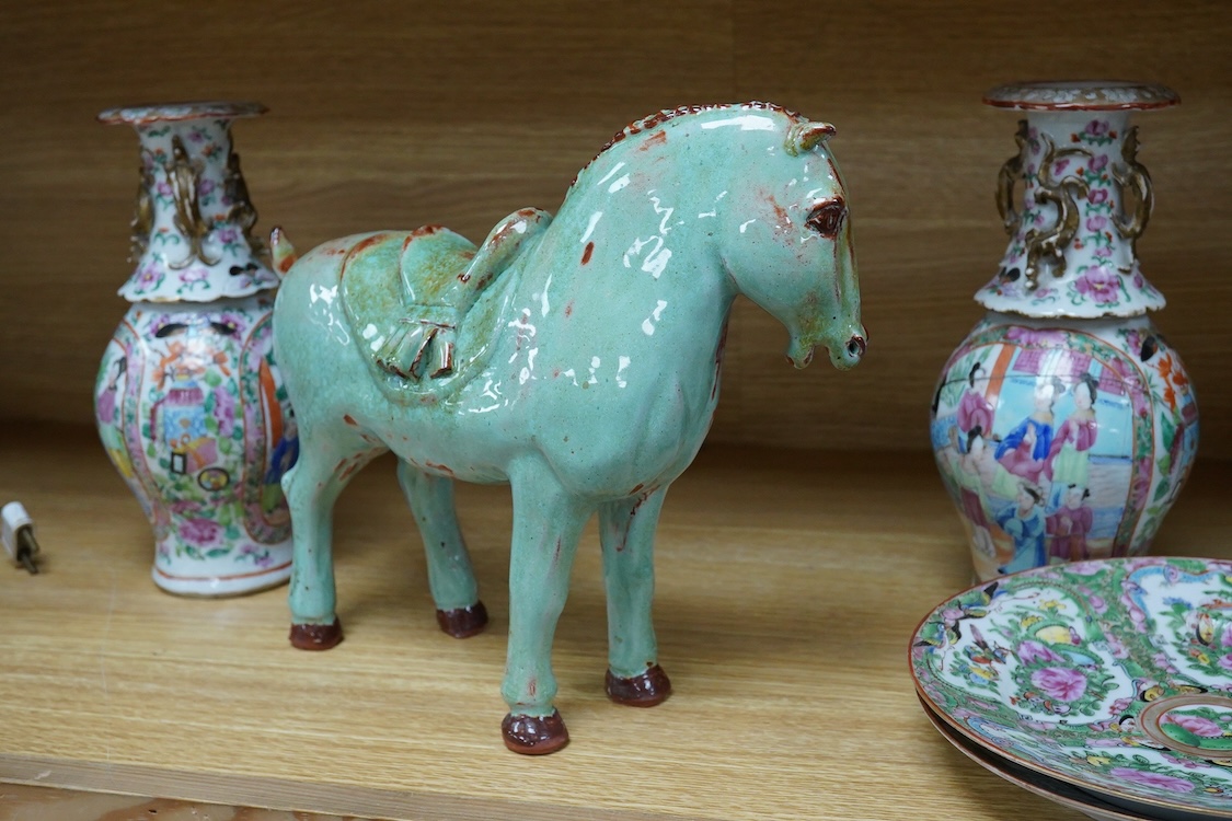 A pair of Chinese famille rose vases, two Canton plates and a green glazed horse, largest 29cm wide